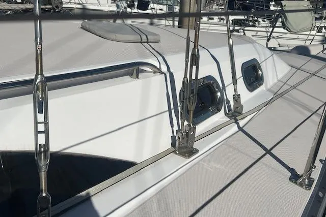 2016 Catalina 385 sailboat deck with rigging and hatches in sunlight.