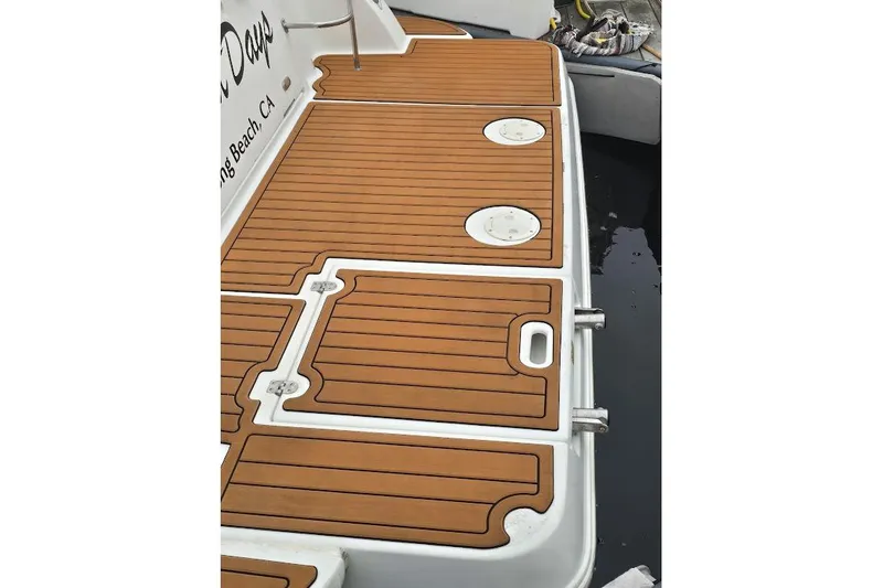 Teak deck of 2001 Cruisers Yachts 340 Express, featuring sleek design and craftsmanship.