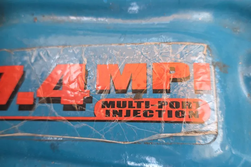 7.4 MPI Multi-Port Injection label on blue surface, 2001 Cruisers Yachts 340 Express.