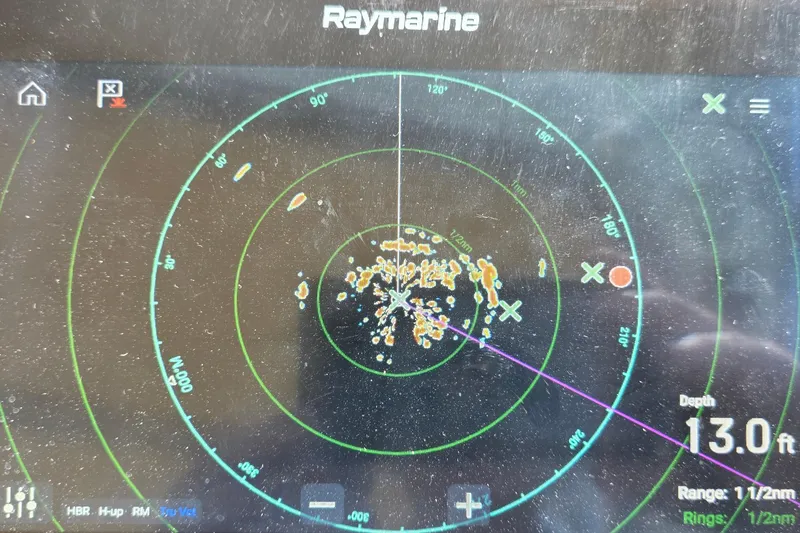 Radar display on a 2001 Cruisers Yachts 340 Express, showing depth of 13 feet.