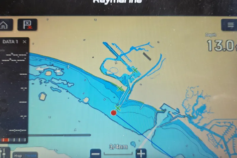 Raymarine navigation display showing nautical chart with depth reading of 13.0 feet.