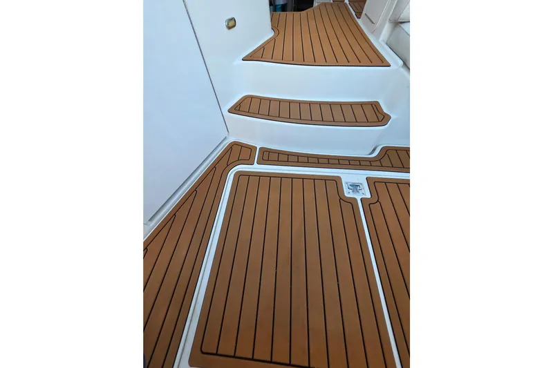 Teak deck flooring on 2001 Cruisers Yachts 340 Express boat.