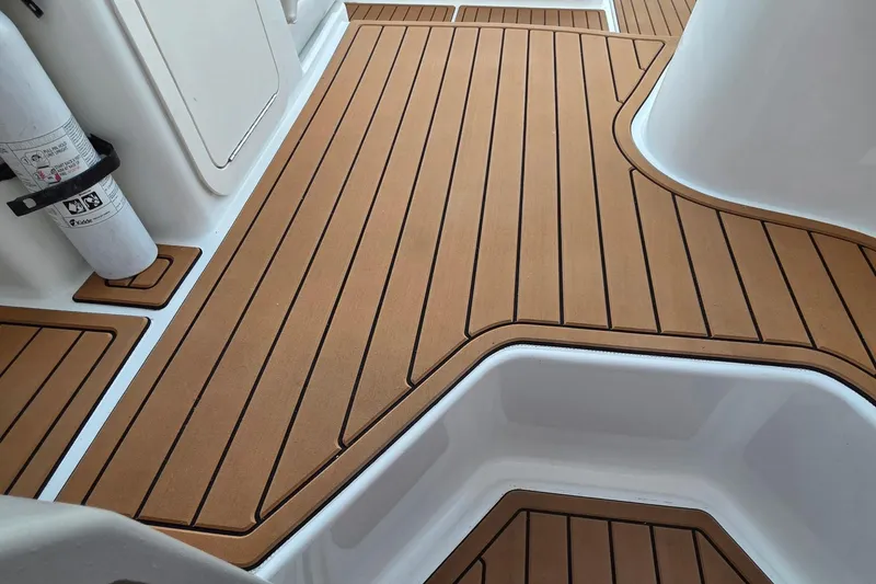 Teak-style deck flooring on 2001 Cruisers Yachts 340 Express boat.