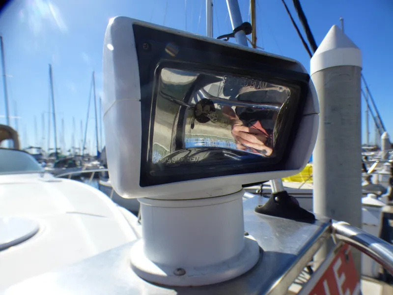 Close-up of a spotlight on a 2001 Cruisers Yachts 340 Express.