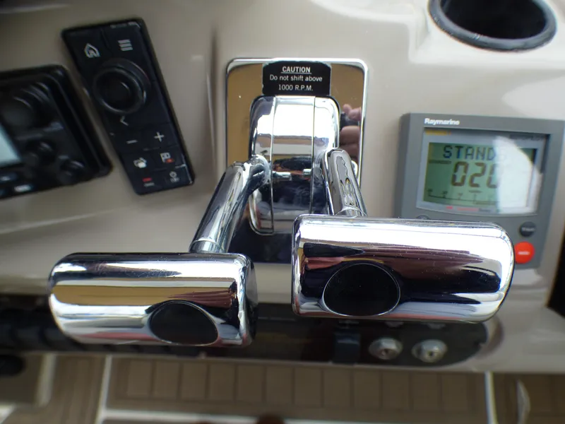 Control console of 2001 Cruisers Yachts 340 Express with controls.