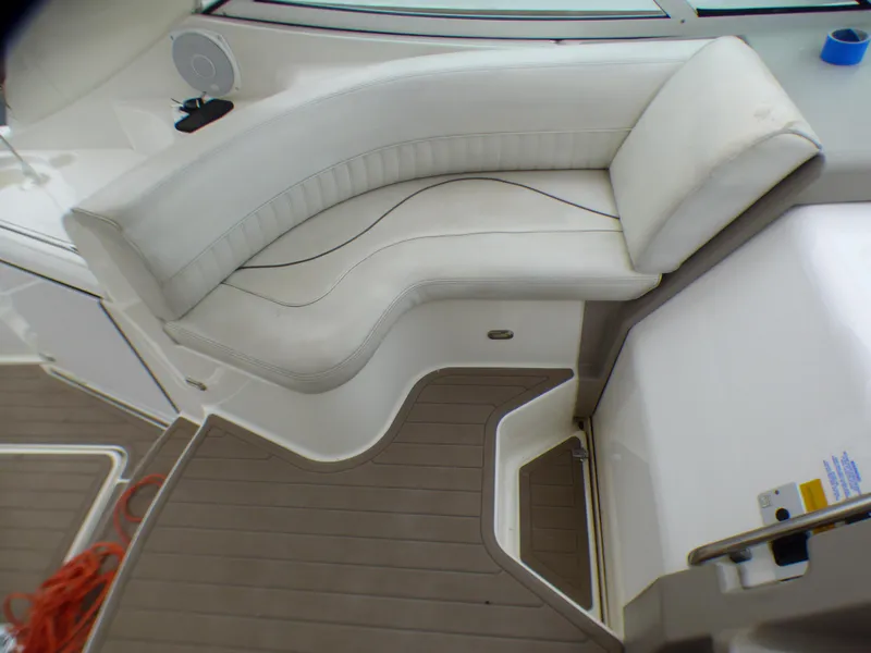 Interior of 2001 Cruisers Yachts 340 Express with white seating area.