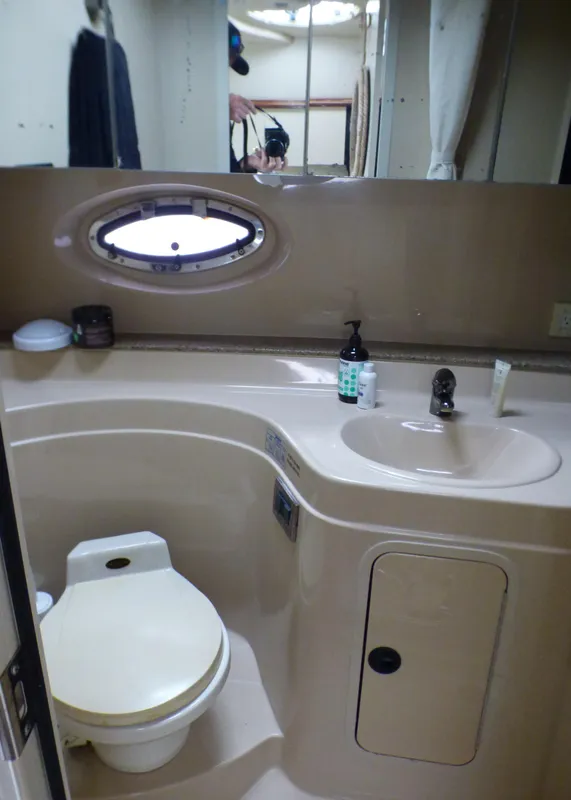 Bathroom in 2001 Cruisers Yachts 340 Express model.