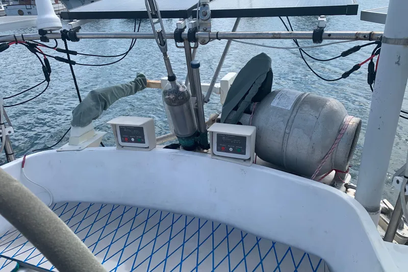 Cockpit of 1972 Tartan 41 sailboat with equipment and propane tank.