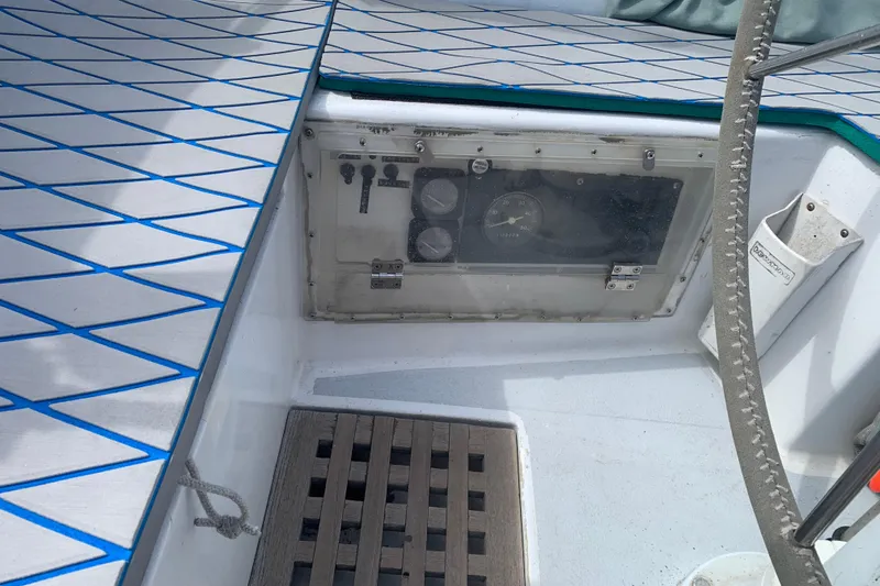 1972 Tartan 41 sailboat cockpit with control panel and patterned deck.