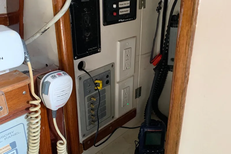 Electrical panel and communication equipment inside a 1972 Tartan 41 sailboat.