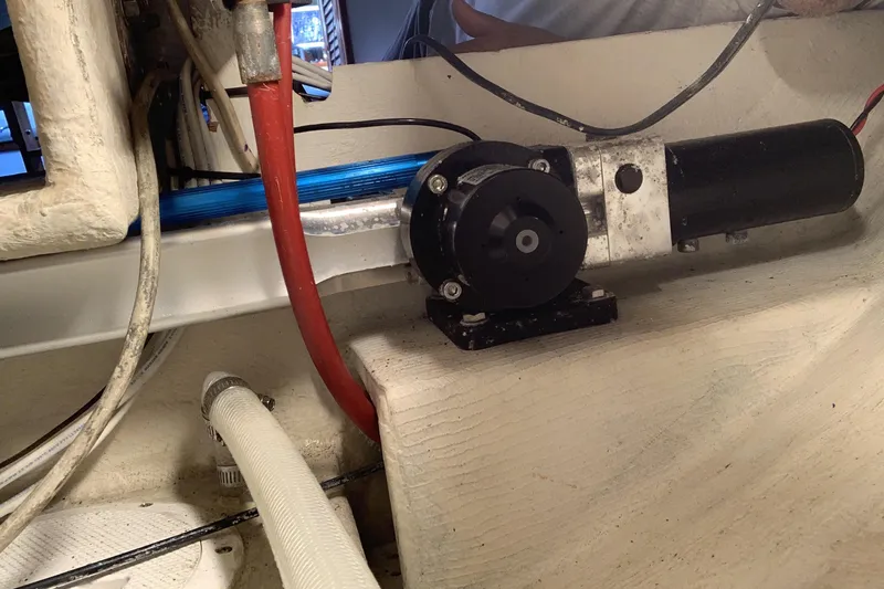 Engine compartment of a 1972 Tartan 41 sailboat, featuring mechanical components and wiring.