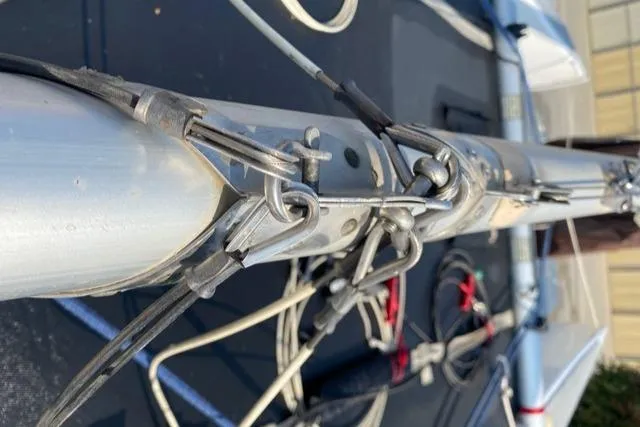 Close-up of 1989 Nacra 5.8 sailboat rigging and mast details.