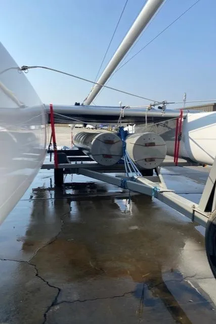 1989 Nacra 5.8 catamaran on trailer, ready for transport.