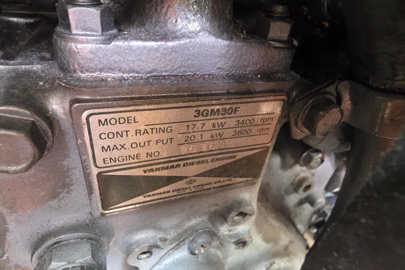 Yanmar diesel engine model 3GM30F label on a 1995 Hunter 336 sailboat.