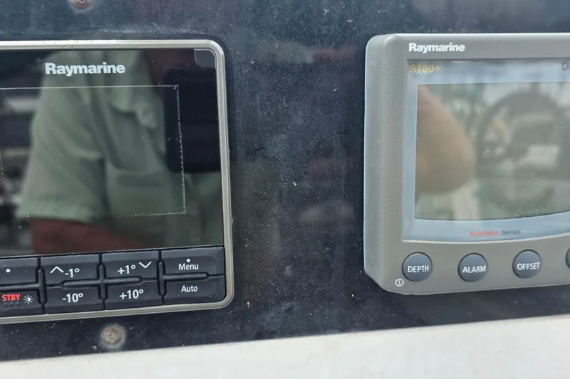 Raymarine navigation instruments on a 1995 Hunter 336 sailboat dashboard.