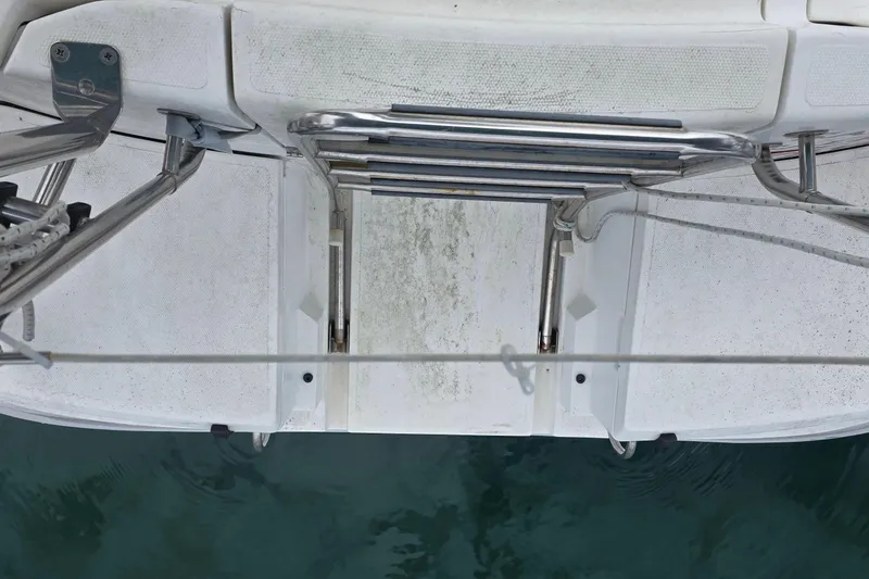 Sailboat swim platform with ladder, Hunter 336, 1995 model, above water view.
