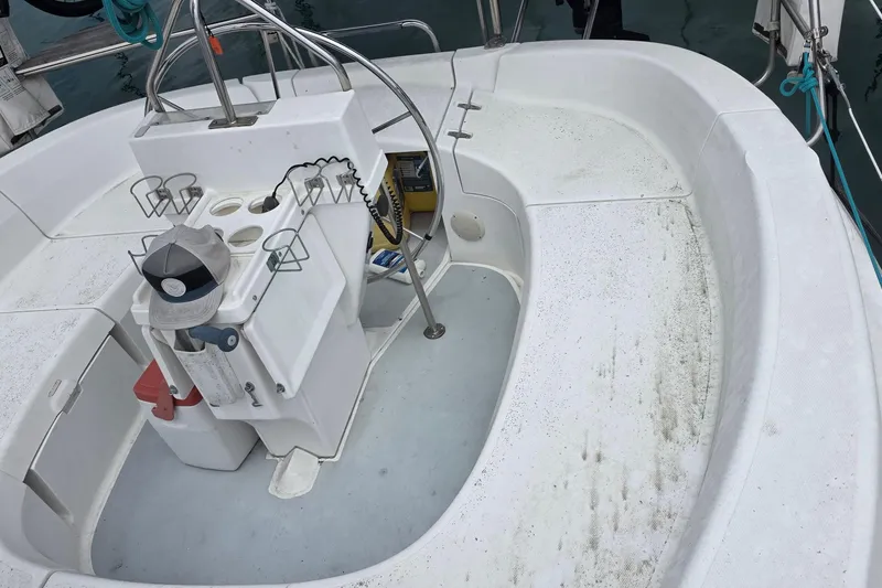 Cockpit of a 1995 Hunter 336 sailboat with seating and steering wheel.