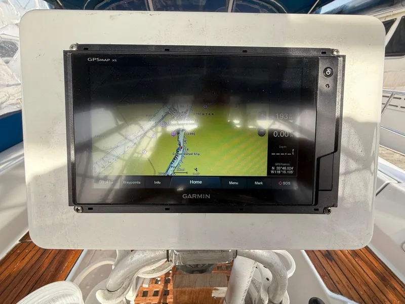 Garmin GPS display on 1986 Beneteau Idylle 15.50 sailboat, showing navigation map.