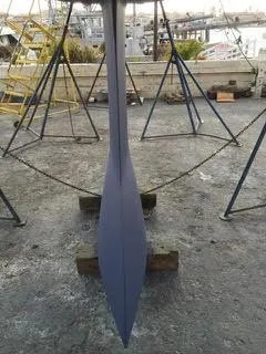 2002 X-Yachts X-382 sailboat keel on stands in a boatyard.