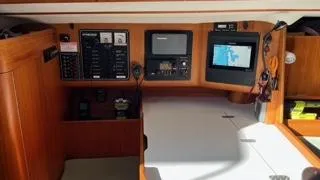 Navigation station of 2002 X-Yachts X-382 with control panels and electronic displays.
