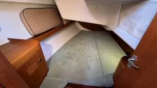 Interior cabin of 2002 X-Yachts X-382, featuring a cozy sleeping area.