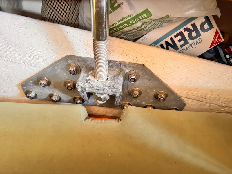 Close-up of a 2002 X-Yachts X-382 sailboat's mast step and bolts.
