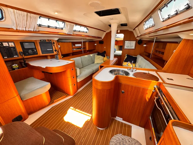 Interior of 2002 X-Yachts X-382 sailboat with wood finish and modern amenities.