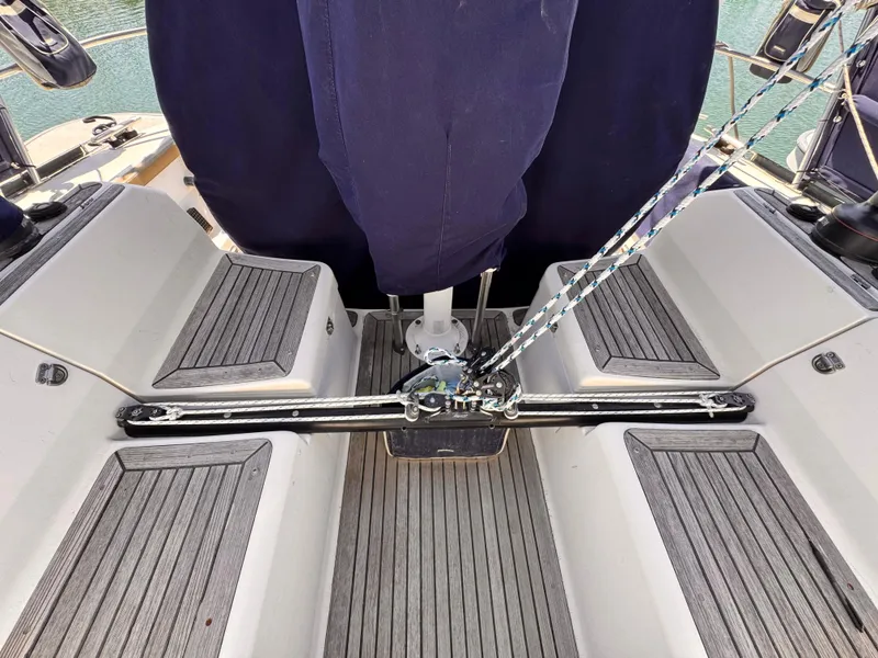 Cockpit of 2002 X-Yachts X-382 sailboat with teak flooring and rigging.