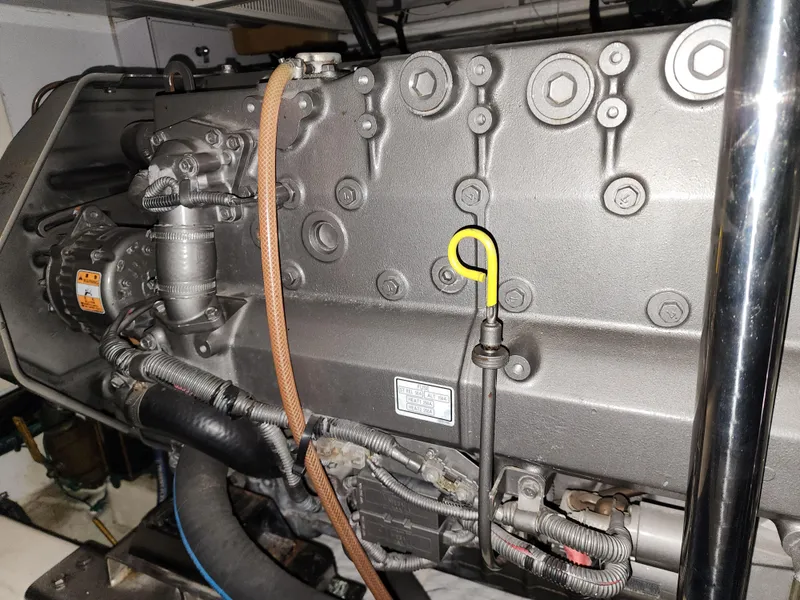 Engine compartment of a 2007 Ocean Alexander Veloce yacht, showcasing detailed mechanical components.