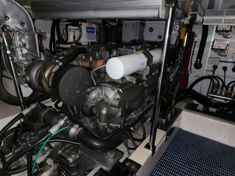 Engine room of 2007 Ocean Alexander Veloce yacht, showcasing complex machinery and components.