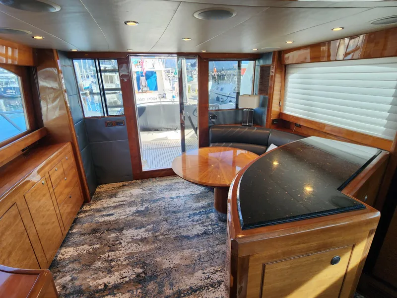 Luxurious interior of 2007 Ocean Alexander Veloce yacht with elegant wood finishes and modern design.