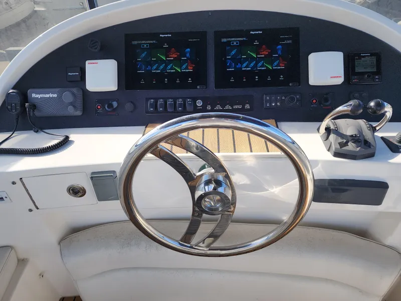 2007 Ocean Alexander Veloce yacht helm with dual displays and modern controls.