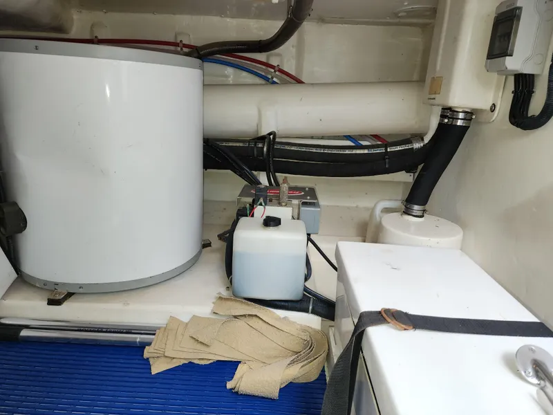 Engine room of 2007 Ocean Alexander Veloce yacht with equipment and storage.