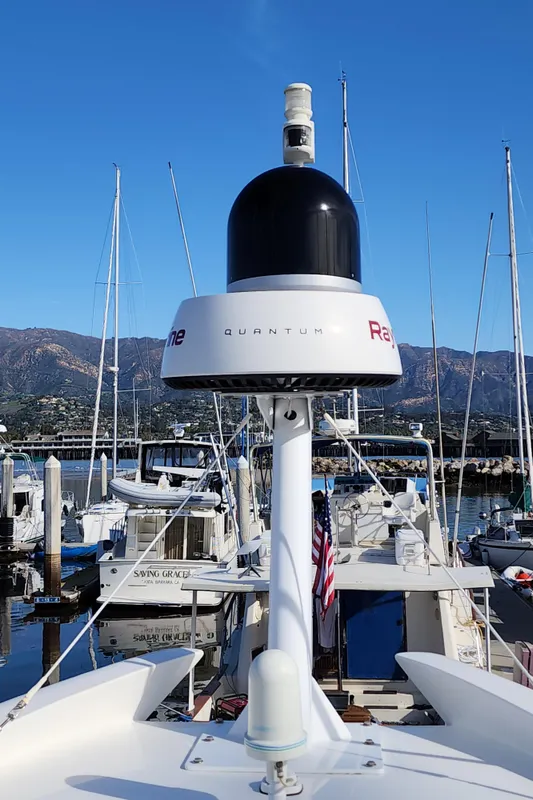 2007 Ocean Alexander Veloce yacht docked at marina with radar equipment.