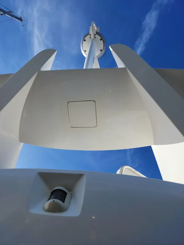 2007 Ocean Alexander Veloce yacht mast against clear blue sky.