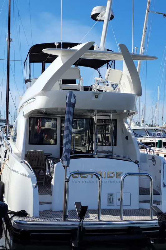 2007 Ocean Alexander Veloce yacht docked at marina, rear view.