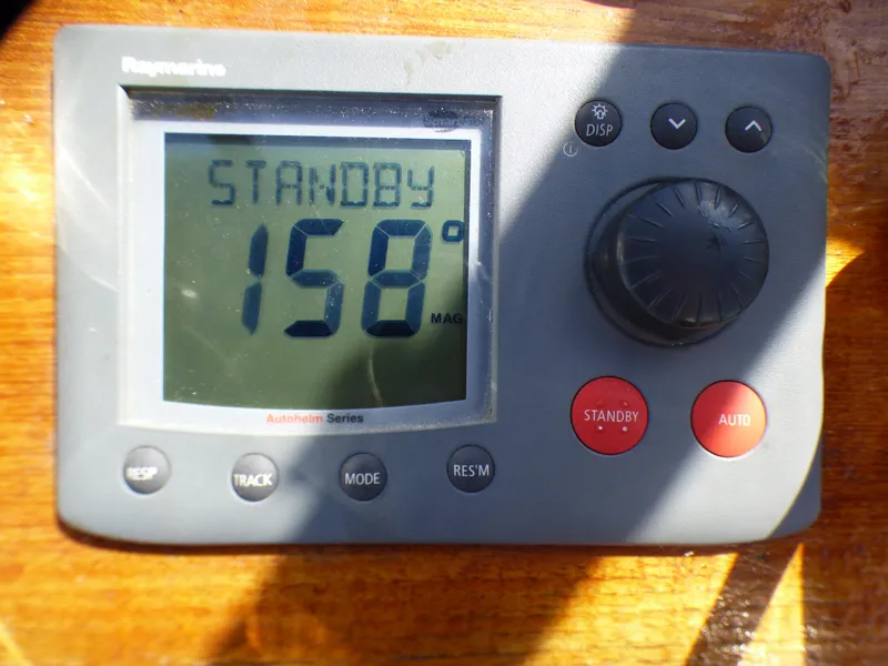 Raymarine autopilot display showing 158 degrees on a Spindrift 39 ft. Aft Cabin Twin Diesel.