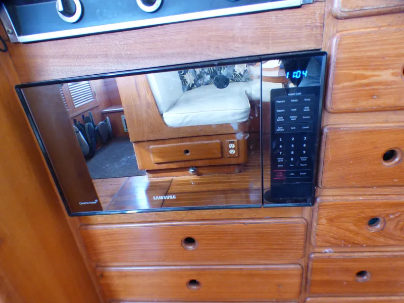 Microwave in 1984 Spindrift 39 ft. Aft Cabin Twin Diesel yacht kitchen.