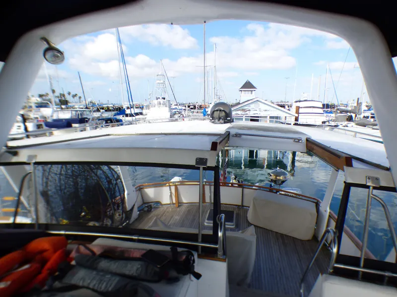 1984 Spindrift 39 ft. Aft Cabin Twin Diesel yacht docked at marina.