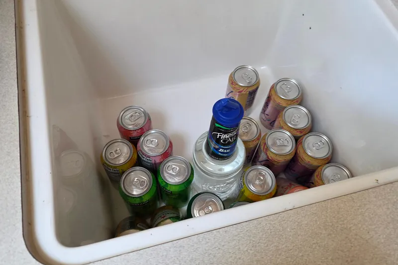 Beverage cans and bottle in sink on Jeanneau 49 Performance, 2007 model.