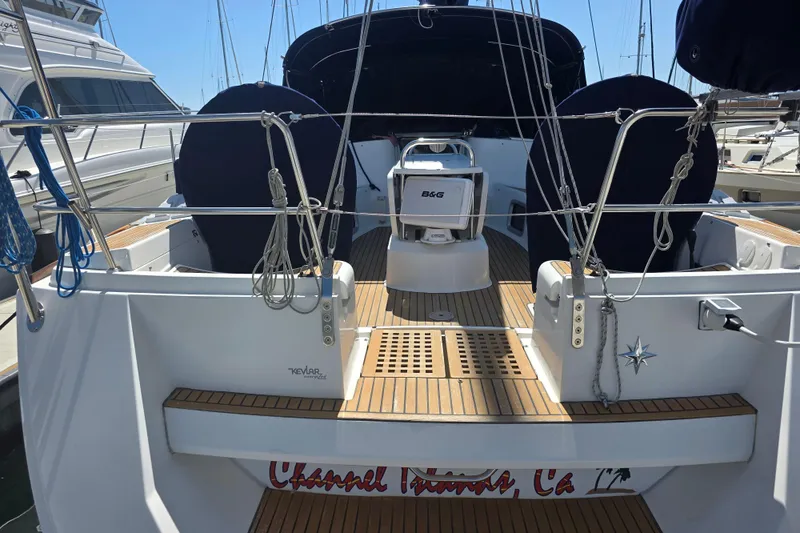 2007 Jeanneau 49 Performance sailboat with teak deck, docked at a marina.
