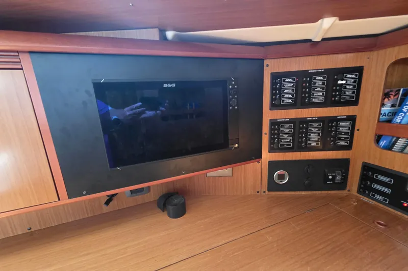 Control panel and navigation screen inside a 2007 Jeanneau 49 Performance yacht.