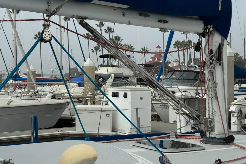 Sailboats docked at marina, featuring a 1991 Catalina 36MKI with visible rigging and masts.