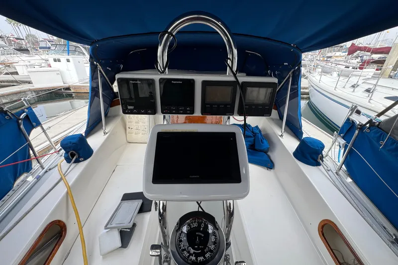 Cockpit of 1991 Catalina 36MKI sailboat with navigation instruments and compass.