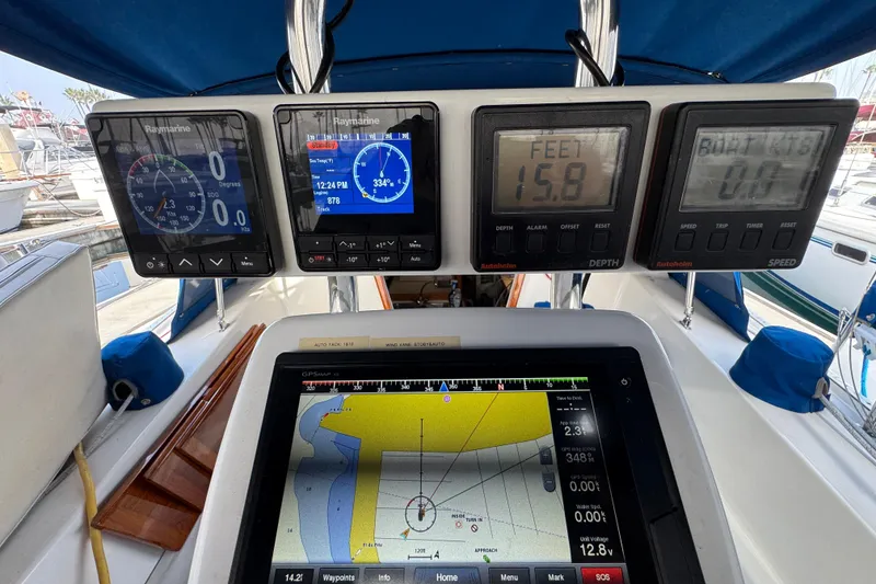 Cockpit navigation instruments on a 1991 Catalina 36MKI sailboat, featuring Raymarine displays.