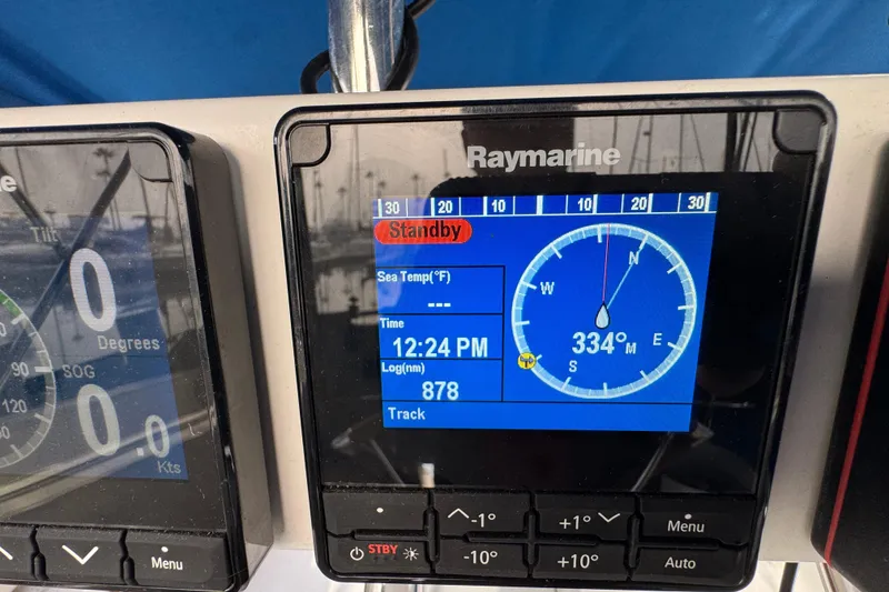 Raymarine navigation display on 1991 Catalina 36MKI, showing compass heading and sea temperature.