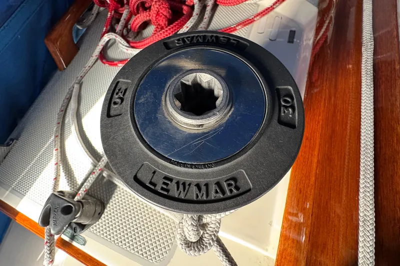 Lewmar winch on 1991 Catalina 36MKI sailboat deck with ropes and wood trim.