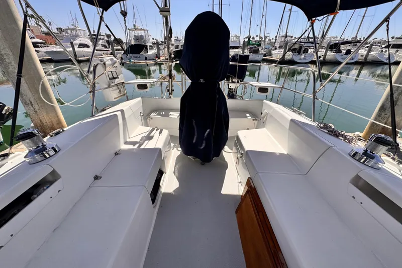 2006 Catalina 34 MkII sailboat cockpit with marina view, featuring seating and covered helm.