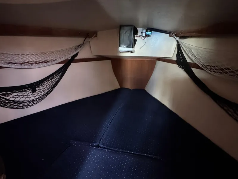 Interior cabin of a 1990 Catalina 30 MkII sailboat with storage nets.