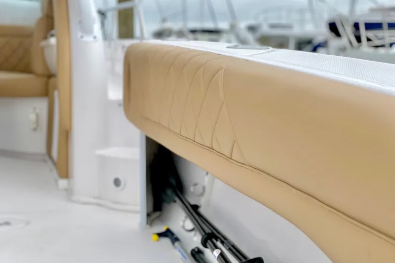 Interior view of a 2006 Donzi 38 ZSF boat with tan leather seating.